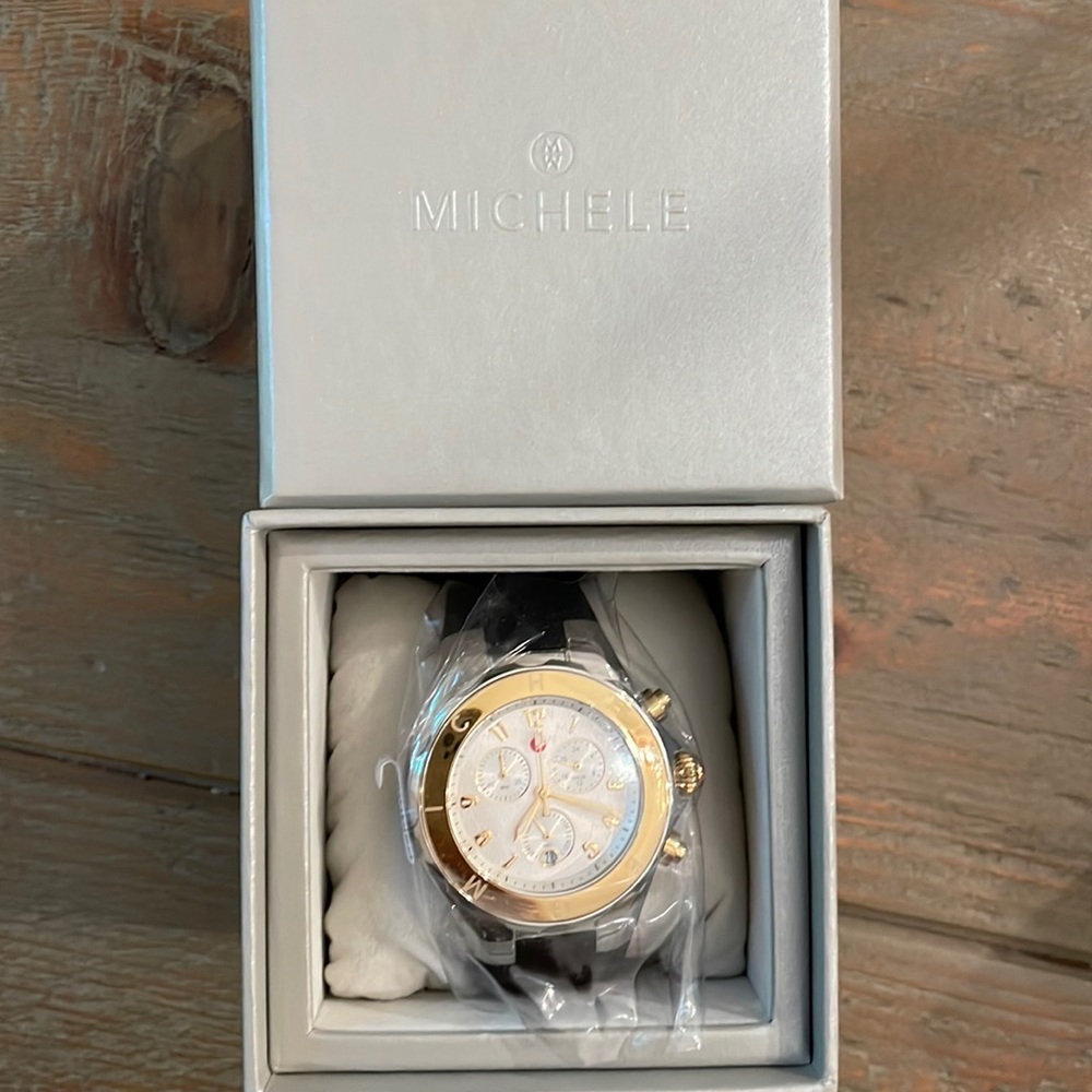 Brand new Michele gold watch with silicone black band